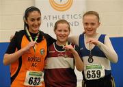 19 March 2011; Competitors, from left to right, Bridget McDyer, Rosses AC, 2nd place, Niamh Fogorty, Mullingar Harriers, 1st place, and Naoimh McGranaghan, Finn Valley AC, 3rd place, with their medals after the U13 Girls Shot Putt. Woodie’s DIY National Juvenile Indoor Championships, Meadowbank Indoor Arena, Magherafelt, Derry. Picture credit: Oliver McVeigh / SPORTSFILE
