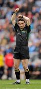 20 March 2011; Referee Maurice Deegan indicates that the offending player had 'over carried' the ball. Allianz Football League Division 1 Round 5, Dublin v Mayo, Croke Park, Dublin. Picture credit: Ray McManus / SPORTSFILE