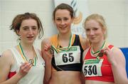 19 March 2011; U17 Girls 60m winner Cliodhna Manning, Kilkenny City Harriers, centre, with second place Claire Foley, Greystones & District, Co. Wicklow, left, and third place Sarah McCarthy, Fingallians AC, Dublin. Woodie’s DIY National Juvenile Indoor Championships, Meadowbank Indoor Arena, Magherafelt, Derry. Picture credit: Oliver McVeigh / SPORTSFILE