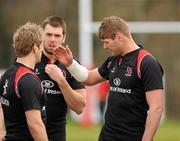 21 March 2011; Ulster's Johann Muller, right, speaking to Chris Henry and Ryan Caldwell during squad training ahead of their Celtic League match against Glasgow Warriors on Friday. Ulster Rugby Squad Training, Newforge Training Ground, Belfast, Co. Antrim. Picture credit: Oliver McVeigh / SPORTSFILE