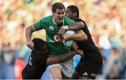 5 November 2016; Jonathan Sexton of Ireland is tackled by Malakai Fekitoa, left, and Waisake Naholo of New Zealand during the International rugby match between Ireland and New Zealand at Soldier Field in Chicago, USA. Photo by Brendan Moran/Sportsfile