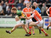 20 March 2011; Colm Cooper, Kerry, in action against Finnian Moriarty, Armagh. Allianz Football League Division 1 Round 5, Armagh v Kerry, Athletic Grounds, Armagh. Picture credit: Brendan Moran / SPORTSFILE
