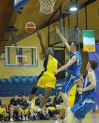 22 March 2011; Joel Omokaro, Coolmine Community School, Dublin, in action against Sam Martin, CBS Thurles, Co. Tipperary. Basketball Ireland Boys U19C Schools League Final, CBS Thurles, Co. Tipperary v Coolmine Community School, Dublin, National Basketball Arena, Tallaght, Co. Dublin. Photo by Sportsfile