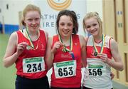 19 March 2011; U15 Girls 60 Hurdles winner Kate McGowan, Tir Chonaill, Co. Donegal, centre, with second place Clodagh O'Mahony, Dooneen, Co. Limerick, left, and third place Laura Ann Costello, Galway City Harriers, Galway. Woodie’s DIY National Junior Indoor Championships, Meadowbank Indoor Arena, Magherafelt, Derry. Picture credit: Oliver McVeigh / SPORTSFILE
