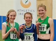 19 March 2011; U13 girls hurdles winner Molly Sweeney, St Lawerence O'Tooles, Co. Carlow, centre, with second place Shannon Sheehy, Cushinstown, Co. Meath, left, and third place Anne Corcoran, Ferrybank, Co. Waterford. Woodie’s DIY National Junior Indoor Championships, Meadowbank Indoor Arena, Magherafelt, Derry. Picture credit: Oliver McVeigh / SPORTSFILE