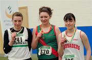 19 March 2011; U16 girls shot putt winner Niamh McLaughlin, Westport AC, Co. Mayo, centre, with second place Aideen Hallahan, Middleton AC, Co. Cork, left, and third place Alex Hughes, Crusaders, Dublin. Woodie’s DIY National Junior Indoor Championships, Meadowbank Indoor Arena, Magherafelt, Derry. Picture credit: Oliver McVeigh / SPORTSFILE