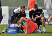 22 March 2011; Republic of Ireland's Sean St. Ledger, receives attention from medical staff during squad training ahead of their EURO2012 Championship Qualifier match against Macedonia on Saturday March 26th. Republic of Ireland Squad Training, Gannon Park, Malahide, Co. Dublin. Picture credit: David Maher / SPORTSFILE
