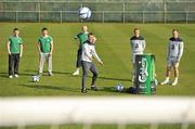 23 March 2011; Republic of Ireland internationals, Glenn Whelan, centre, with Liam Lawrence, far right, and Paul Green, second from right, were put to the test in a skills challenge against Carlsberg competition winner Shane O'Driscoll to 'Challenge the Boys in Green'. Shane O’Driscoll, third from right, from Wilton, in Cork, and his two friends, Robert Atkinson, second from right, and Andrew Merigan, both from Dublin, travelled to Ireland's training facility at Gannon Park, Malahide earlier today where they challenged the Irish players to hit the crossbar form the edge of the box. Carlsberg is the official beer of the Football Association of Ireland and also a sponsor of the EURO 2012 European Championship finals. Gannon Park, Malahide, Co. Dublin. Picture credit: David Maher / SPORTSFILE