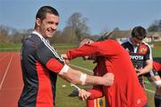 23 March 2011; Munster's Alan Quinlan is strapped up by physio Neil Tucker before squad training ahead of their Celtic League match against Cardiff Blues on Friday. Munster Rugby Squad Training, University of Limerick, Limerick. Picture credit: Diarmuid Greene / SPORTSFILE