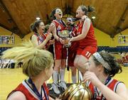 23 March 2011; Pobail Scoil Chorca Dhuibhne, Co. Kerry, players celebrate with the cup. Basketball Ireland Girls U19A Schools League Final, Pobail Scoil Chorca Dhuibhne, Co. Kerry v St. Josephs, Abbeyfeale, Co. Limerick, National Basketball Arena, Tallaght, Co. Dublin. Picture credit: Brian Lawless / SPORTSFILE