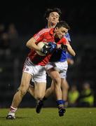 23 March 2011; Mark Collins, Cork, in action against Eddie Kenrick, Tipperary. Cadbury Munster GAA Football Under 21 Championship Semi-Final, Cork v Tipperary, Pairc Ui Rinn, Cork. Picture credit: Stephen McCarthy / SPORTSFILE