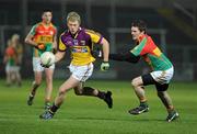 23 March 2011; Killian Kehoe, Wexford, in action against Conor Lawlor, Carlow. Cadbury Leinster GAA Football Under 21 Championship Semi-Final, Carlow v Wexford, O'Moore Park, Portlaoise, Co. Laois. Picture credit: Matt Browne / SPORTSFILE