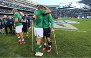 5 November 2016; Conor Murray of Ireland with injured team-mate Jordi Murphy after the International rugby match between Ireland and New Zealand at Soldier Field in Chicago, USA. Photo by Brendan Moran/Sportsfile