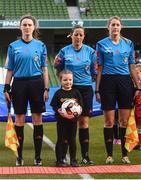 6 November 2016; The Continental Tyres ball carrier Maisy Moore, age 7, from Dublin carries the match ball beside referee Deidre Nolan before the start of the Continental Tyres Women's Senior Cup Final game between Wexford Youths and Shelbourne at Aviva Stadium in Lansdowne Road, Dublin. Photo by David Maher/Sportsfile