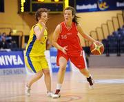 24 March 2011; Erin Bracken, right, Colaiste Chiarain, Leixlip, Co. Kildare, in action against Mairead Charlton, St. Louis Community School, Kiltimagh, Co. Mayo. Basketball Ireland Girls U16C Schools League Final, Colaiste Chiarain, Leixlip, Co. Kildare v St. Louis Community School, Kiltimagh, Co. Mayo, National Basketball Arena, Tallaght, Co. Dublin. Picture credit: Barry Cregg / SPORTSFILE