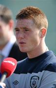 24 March 2011; Republic of Ireland's James McCarthy speaking to members of the media after squad training ahead of their EURO2012 Championship Qualifier match against Macedonia on Saturday. Republic of Ireland Squad Training, Gannon Park, Malahide, Co. Dublin. Picture credit: Matt Browne / SPORTSFILE