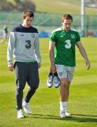 24 March 2011; Republic of Ireland's Sean St Ledger, left, and Liam Lawrence leave the pitch after squad training ahead of their EURO2012 Championship Qualifier match against Macedonia on Saturday. Republic of Ireland Squad Training, Gannon Park, Malahide, Co. Dublin. Picture credit: Brendan Moran / SPORTSFILE