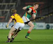 23 March 2011; Eddie Byrne, Carlow, in action against James Breen, Wexford. Cadbury Leinster GAA Football Under 21 Championship Semi-Final, Carlow v Wexford, O'Moore Park, Portlaoise, Co. Laois. Picture credit: Matt Browne / SPORTSFILE