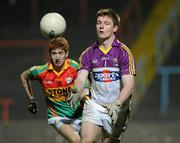 23 March 2011; Richard Farrell, Wexford, in action against Daryl Roberts, Carlow. Cadbury Leinster GAA Football Under 21 Championship Semi-Final, Carlow v Wexford, O'Moore Park, Portlaoise, Co. Laois. Picture credit: Matt Browne / SPORTSFILE