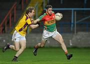 23 March 2011; Hughie Gahan, Carlow, in action against James Breen, Wexford. Cadbury Leinster GAA Football Under 21 Championship Semi-Final, Carlow v Wexford, O'Moore Park, Portlaoise, Co. Laois. Picture credit: Matt Browne / SPORTSFILE
