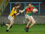 23 March 2011; Hughie Gahan, Carlow, in action against James Breen, Wexford. Cadbury Leinster GAA Football Under 21 Championship Semi-Final, Carlow v Wexford, O'Moore Park, Portlaoise, Co. Laois. Picture credit: Matt Browne / SPORTSFILE