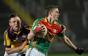 23 March 2011; Paul McElligot, Carlow, in action against Emmet Kent, Wexford. Cadbury Leinster GAA Football Under 21 Championship Semi-Final, Carlow v Wexford, O'Moore Park, Portlaoise, Co. Laois. Picture credit: Matt Browne / SPORTSFILE