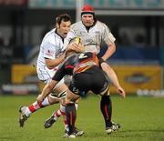 18 March 2011; Pedrie Wannenburg, Ulster, supported by team-mate Johann Muller,is tackled by Lloyd Burns, Dragons. Celtic League, Ulster v Dragons, Ravenhill Park, Belfast, Co. Antrim. Picture credit: Oliver McVeigh / SPORTSFILE