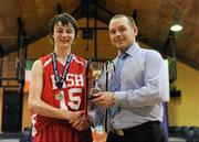 24 March 2011; St. Josephs &quot;Bish&quot;, Galway, captain receives the trophy from Conor Lilly, Competitions Officer Basketball Ireland, after the game. Basketball Ireland Boys U16A Schools League Final, Presentation College, Bray, Co. Wicklow v St. Josephs &quot;Bish&quot;, Galway, National Basketball Arena, Tallaght, Co. Dublin. Picture credit: Barry Cregg / SPORTSFILE