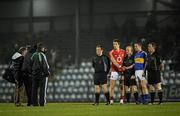 23 March 2011; Referee Maurice Condon, Waterford, and his officials with Cork captain Aidan Walsh and Tipperary captain Peter Acheson ahead of the game. Cadbury Munster GAA Football Under 21 Championship Semi-Final, Cork v Tipperary, Pairc Ui Rinn, Cork. Picture credit: Stephen McCarthy / SPORTSFILE
