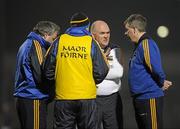 23 March 2011; Tipperary manager John Evans in conversation with his selectors. Cadbury Munster GAA Football Under 21 Championship Semi-Final, Cork v Tipperary, Pairc Ui Rinn, Cork. Picture credit: Stephen McCarthy / SPORTSFILE