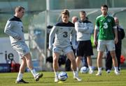 25 March 2011; Republic of Ireland's Richard Dunne in action against his team-mate Kevin Doyle during squad training ahead of their EURO2012 Championship Qualifier match against Macedonia on Saturday. Republic of Ireland Squad Training, Gannon Park, Malahide, Co. Dublin. Picture credit: David Maher / SPORTSFILE