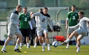 25 March 2011; Republic of Ireland's Kevin Doyle, right, in action with his team-mates Liam Lawrence, centre, and Richard Dunne during squad training ahead of their EURO2012 Championship Qualifier match against Macedonia on Saturday. Republic of Ireland Squad Training, Gannon Park, Malahide, Co. Dublin. Picture credit: David Maher / SPORTSFILE