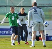 25 March 2011; Republic of Ireland captain Robbie Keane in action against his team-mates Damien Duff and Richard Dunne during squad training ahead of their EURO2012 Championship Qualifier match against Macedonia on Saturday. Republic of Ireland Squad Training, Gannon Park, Malahide, Co. Dublin. Picture credit: David Maher / SPORTSFILE