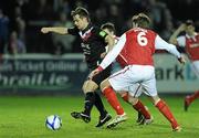25 March 2011; Greg Bolger, Dundalk, in action against Stephen Bradley and Shane McFaul, St Patrick's Athletic. Airtricity League Premier Division, St Patrick's Athletic v Dundalk, Richmond Park, Inchicore, Dublin. Picture credit: Matt Browne / SPORTSFILE