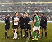 6 November 2016; Referee Rob Rogers tosses the coin up between the two captains of Greg Bolger of Cork City and Stephen O'Donnell of Dundalk before the start of the Irish Daily Mail FAI Cup Final match between Cork City and Dundalk at Aviva Stadium in Lansdowne Road, Dublin. Photo by David Maher/Sportsfile
