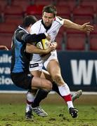 25 March 2011; Simon Danelli, Ulster, is tackled by Frederico Aramburu, Glasgow Warriors. Celtic League, Glasgow Warriors v Ulster, Firhill Arena, Glasgow, Scotland. Picture credit: Bill Murray / SPORTSFILE