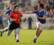 26 March 2011; Conal McKeever, Dundalk Schools, in action against Ryan Johnston, St Colmans, Newry. All-Ireland Senior College's A Football Championship Semi-Final, Dundalk Schools v St Colmans, Newry, St Oliver Plunkett's Park, Crossmaglen, Co. Armagh. Picture credit: Oliver McVeigh / SPORTSFILE