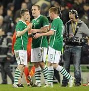 26 March 2011; Republic of Ireland players, from left, Robbie Keane, Richard Dunne and James McCarthy celebrate victory at the end of the game. EURO2012 Championship Qualifier, Republic of Ireland v Macedonia, Aviva Stadium, Lansdowne Road, Dublin. Picture credit: Brendan Moran / SPORTSFILE