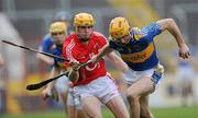 27 March 2011; Shane McGrath, Tipperary, in action against Cathal Naughton, Cork. Allianz Hurling League, Division 1, Round 5, Cork v Tipperary, Pairc Ui Chaoimh, Cork. Picture credit: Brian Lawless / SPORTSFILE