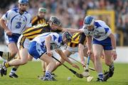 27 March 2011; Darragh Fives, supported by his Waterford team-mate Wayne Hutchison, tries to gather the sliothar under pressure from Kilkenny substitute Matthew Ruth. Allianz Hurling League, Division 1, Round 5, Kilkenny v Waterford, Nowlan Park, Kilkenny. Picture credit: Ray McManus / SPORTSFILE