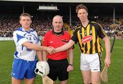 27 March 2011; The two captains, Stephen Molumphy, Waterford, and Brian Hogan, Kilkenny, shake hands accross referee John Sexton before the game. Allianz Hurling League, Division 1, Round 5, Kilkenny v Waterford, Nowlan Park, Kilkenny. Picture credit: Ray McManus / SPORTSFILE