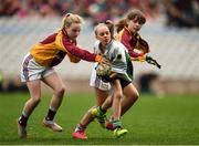 9 November 2016; Joy Ralph of St. Pius X GNS, Terenure, in action against Ella Hegarty, left, and Anna Frawley of Rush NS, during the Corn Austin Finn shield final at the Allianz Cumann na mBunscol Finals in Croke Park, Dublin. Photo by Stephen McCarthy/Sportsfile