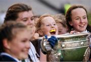 9 November 2016; Jessica Todd, centre, and her Mount Sackville PS, Chapelizod team-mates get their hands on the Sam Maguire Cup following their side's Corn Irish Rubies Final victory over Divine Mercy SNS, Balgaddy, Lucan, at the Allianz Cumann na mBunscol Finals in Croke Park, Dublin. Photo by Stephen McCarthy/Sportsfile