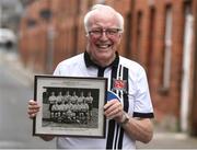 31 October 2016; Former Dundalk player Joe Martin, holding a team photograph of the 1952 FAI Cup winning team, poses for a portrait at Oriel Park in Dundalk, Co.Louth. Photo by David Maher/Sportsfile