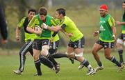 29 March 2011; Munster's Mike Sherry is tackled by David Wallace during squad training ahead of their Celtic League match against Leinster on Saturday. Munster Rugby Squad Training, CIT, Bishopstown, Cork. Picture credit: Diarmuid Greene / SPORTSFILE