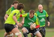 29 March 2011; Munster's Denis Fogarty is tackled by Donncha O'Callaghan during squad training ahead of their Celtic League match against Leinster on Saturday. Munster Rugby Squad Training, CIT, Bishopstown, Cork. Picture credit: Diarmuid Greene / SPORTSFILE