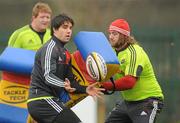 29 March 2011; Munster's Conor Murray in action against Dave Ryan during squad training ahead of their Celtic League match against Leinster on Saturday. Munster Rugby Squad Training, CIT, Bishopstown, Cork. Picture credit: Diarmuid Greene / SPORTSFILE