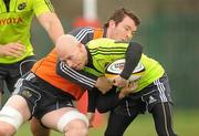 29 March 2011; Munster's Peter Stringer is tackled by Peter O'Mahony during squad training ahead of their Celtic League match against Leinster on Saturday. Munster Rugby Squad Training, CIT, Bishopstown, Cork. Picture credit: Diarmuid Greene / SPORTSFILE