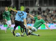 29 March 2011; Damien Delaney, Republic of Ireland, in action against Martin Cacedes, Uruguay. International Friendly, Republic of Ireland v Uruguay, Aviva Stadium, Lansdowne Road, Dublin. Picture credit: Brian Lawless / SPORTSFILE