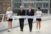 30 March 2011; Jim Aughney, Dublin Marathon Race Director, Dermot Griffin, Chief Executive, National Lottery, second from right, with models Jenny Lee Masterson, left, and Michele McGrath at the announcement that the National Lottery are to be the Dublin Marathon sponsor. The National Lottery Dublin Marathon takes place on Bank Holiday Monday, 31st of October 2011. The Convention Cente Dublin, Spencer Dock, Dublin. Picture credit: Ray McManus / SPORTSFILE